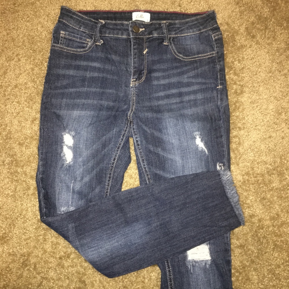 Cello skinny distressed blue wash jeans.